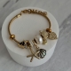 ( DP426 ) Pulsera con Charms Acero Dorado